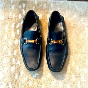 Men’s Gucci Loafers. Black with bamboo and brass buckle. Size 9.